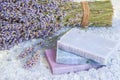 Natural soap, lavender, salt on a wooden board, hygiene items for bath and spa. Royalty Free Stock Photo