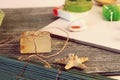 Natural soap, leaves, flowers on a wooden table