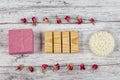 Natural soap, Rose Soap. Natural handmade soap with dried pink roses on wooden board. Spa Royalty Free Stock Photo