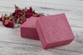 Natural soap, Rose Soap. Natural handmade soap with dried pink roses on wooden board. Spa Royalty Free Stock Photo