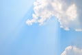 Natural soft clouds pattern and sunshine ray on blue sky background Royalty Free Stock Photo