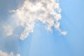 Natural soft clouds pattern and sunshine ray on blue sky background Royalty Free Stock Photo