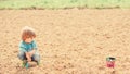 Natural soil. new technology in farming. small kid planting a flower. ecology life. eco farm. human and nature. earth Royalty Free Stock Photo