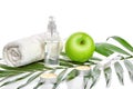 Natural spa beauty treatment cleansing products with apple on white background. Royalty Free Stock Photo