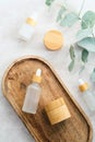 Natural SPA cosmetics in wooden and glass eco packaging on stone table. Organic bath beauty products collection. Skincare concept Royalty Free Stock Photo