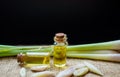 Top view Natural Spa Ingredients Lemongrass essential Oil with Aromatherapy Burners on wooden background. copy space Royalty Free Stock Photo