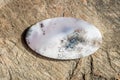 Natural stone agate on the wooden background