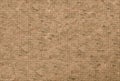 Natural stone background, beige base ornament maze on the surface of the canvas, rustic paper