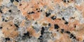 Natural stone background image. Reddish stone with quartz.