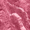 Natural stone background of part of rock formation toned in color 2023 Viva Magenta