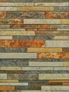 Natural stone brick wall texture background with rustic layered tiles. Royalty Free Stock Photo