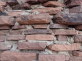 Natural stone bricks held together by mortar closeup