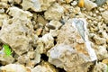 Natural stone dolomite in the limestone open-pit. Building materials, wall background, texture Royalty Free Stock Photo