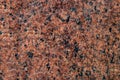 Natural stone granite background. Red granite stone. Granite untreated surface. Royalty Free Stock Photo
