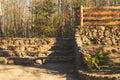 Natural stone ladder. wooden fencing. nature background