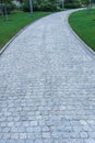 Natural stone paving walkway in the garden. Royalty Free Stock Photo