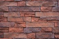 Natural stone wall background - red tiled brick stones Royalty Free Stock Photo