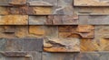 Natural stone wall panel texture showcasing a variety of earthy colors and patterns, ideal for home decor, interior design, and Royalty Free Stock Photo