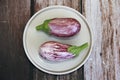 Natural striped vegetable eggplant on a decorative plate