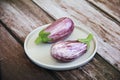 Natural striped vegetable eggplant on a decorative plate