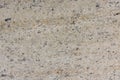 Natural structure of granite, yellow and beige, sanded board