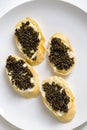 Natural sturgeon black caviar sandwiches, luxury seafood delicacy Royalty Free Stock Photo