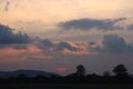 Natural Sunset Sunrise Over Field Or Meadow. Real amazing panoramic sunrise or sunset sky with gentle colorful clouds. Royalty Free Stock Photo