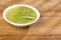 Natural sweetener in powder from stevia plant - Stevia rebaudiana. Royalty Free Stock Photo