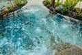 Natural swimming pond or natural spa jacuzzi for a small garden Royalty Free Stock Photo