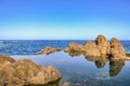 Natural swimming pools in the Atlantic ocean, Porto Moniz, Madeira Island, Portugal. Made up of volcanic rock, into which the sea Royalty Free Stock Photo