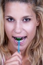 Natural teen with a lollipop Royalty Free Stock Photo