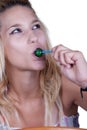 Natural teen with a lollipop Royalty Free Stock Photo