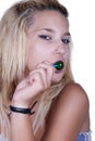 Natural teen with a lollipop Royalty Free Stock Photo