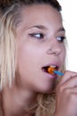 Natural teen with a lollipop Royalty Free Stock Photo