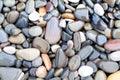 Natural texture background, colorful sea stones in water, top view