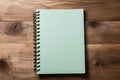 Natural touch Top view notebook resting gently on the wooden floor