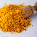 Natural turmeric powder on white acrylic background Royalty Free Stock Photo
