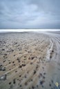 Natural view of the beach in Bjerregard, Denmark under a cloudy sky Royalty Free Stock Photo