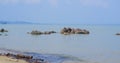 A Rock In The Middle Of The Sea On Your Tanjung Beach