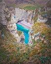 Natural view to famous Falaise d\'Aval coastline cliffs and a bay with blue ocean water at Etretat, Normandy, France