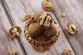 Natural walnut fruit in a hard brown shell Royalty Free Stock Photo