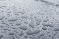 Natural water drops on a glass table after rain. Royalty Free Stock Photo
