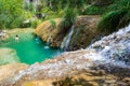 Natural waterfall and lake in Polilimnio area in Greece. Royalty Free Stock Photo