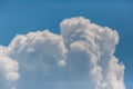 White banked up cumulus cloud, blue sky, sunshine Royalty Free Stock Photo