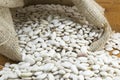 Natural white beans in a bag Royalty Free Stock Photo