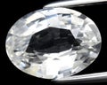 natural white sapphire gem on the background Royalty Free Stock Photo