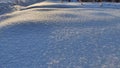 Natural winter background with snow drifts and falling snow Royalty Free Stock Photo