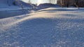 Natural winter background with snow drifts and falling snow Royalty Free Stock Photo