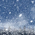 Natural Winter Christmas background with blue sky, heavy snowfall, snowflakes in different shapes and forms, snowdrifts. Winter Royalty Free Stock Photo