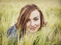 Natural woman posing in the wheat field, beauty and nature